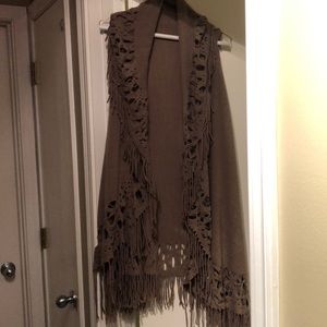 Long Brown Vest with fringe. One size fits all.